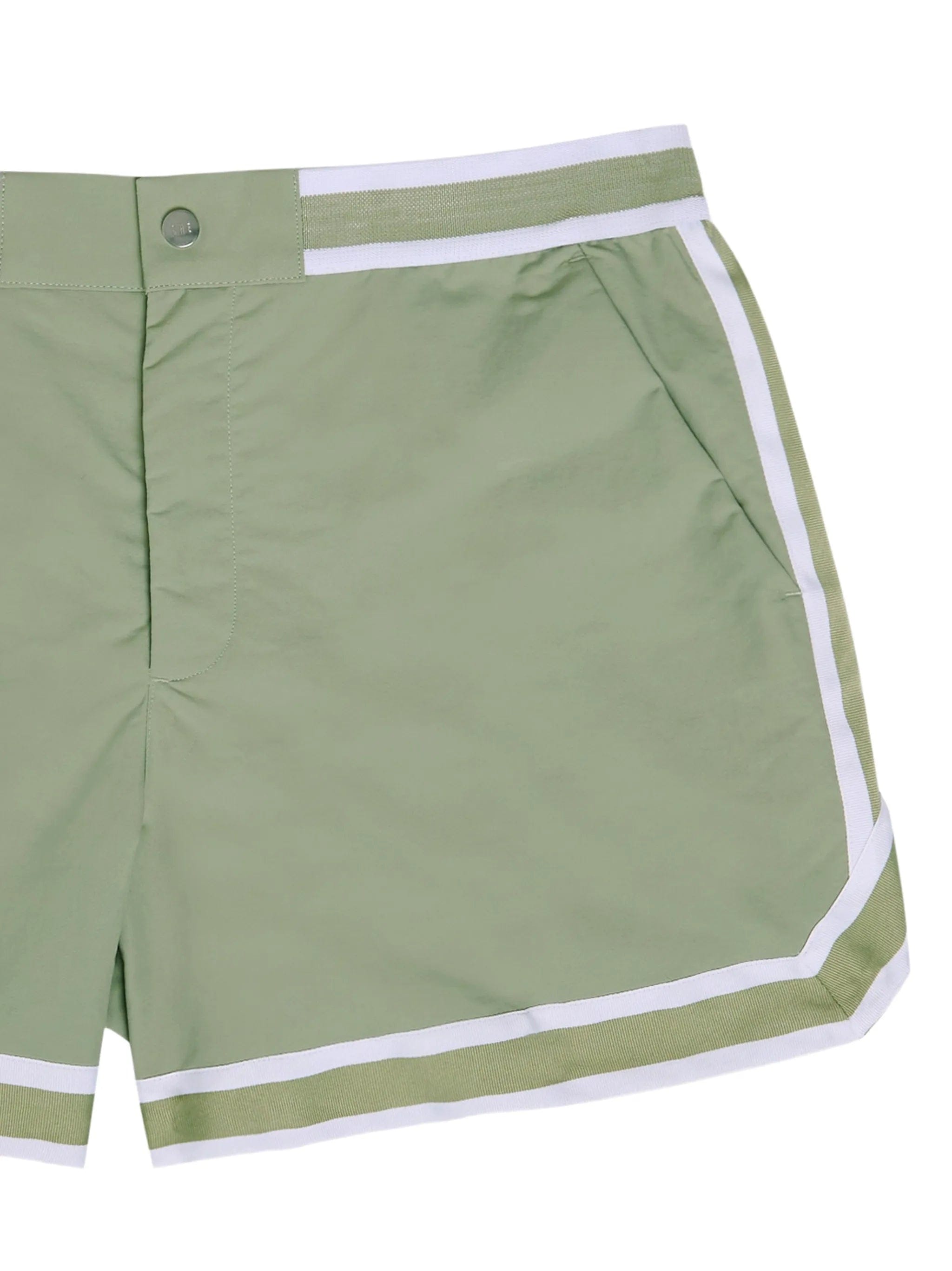 CHÉ Baller striped swim shorts
