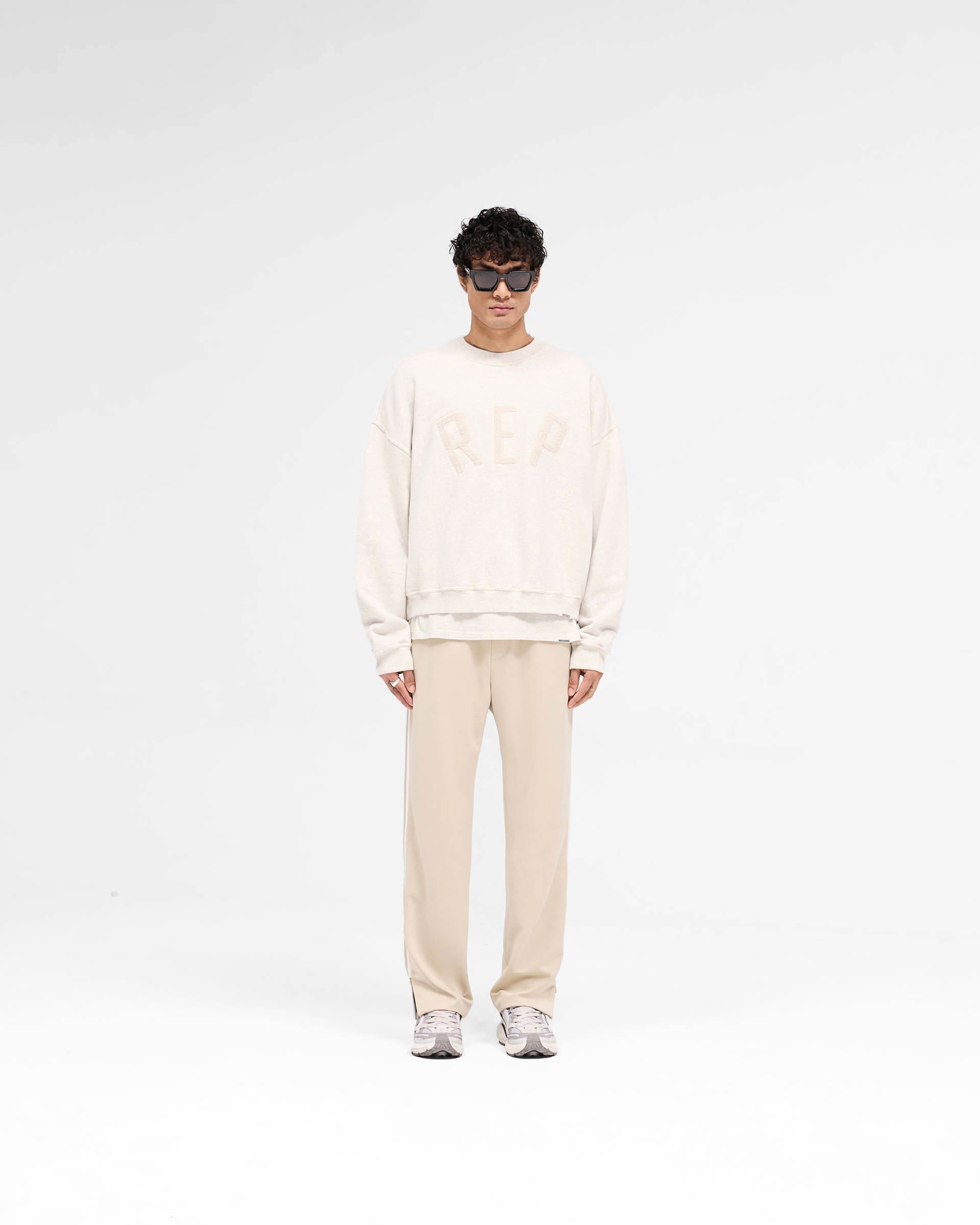 SS25 Rep Applique Sweater - Cream Marl
