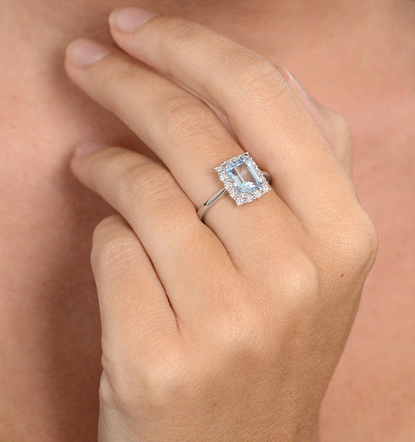 Diamond Blue Topaz 8 x 6 mm and Diamond 9K White Gold Ring