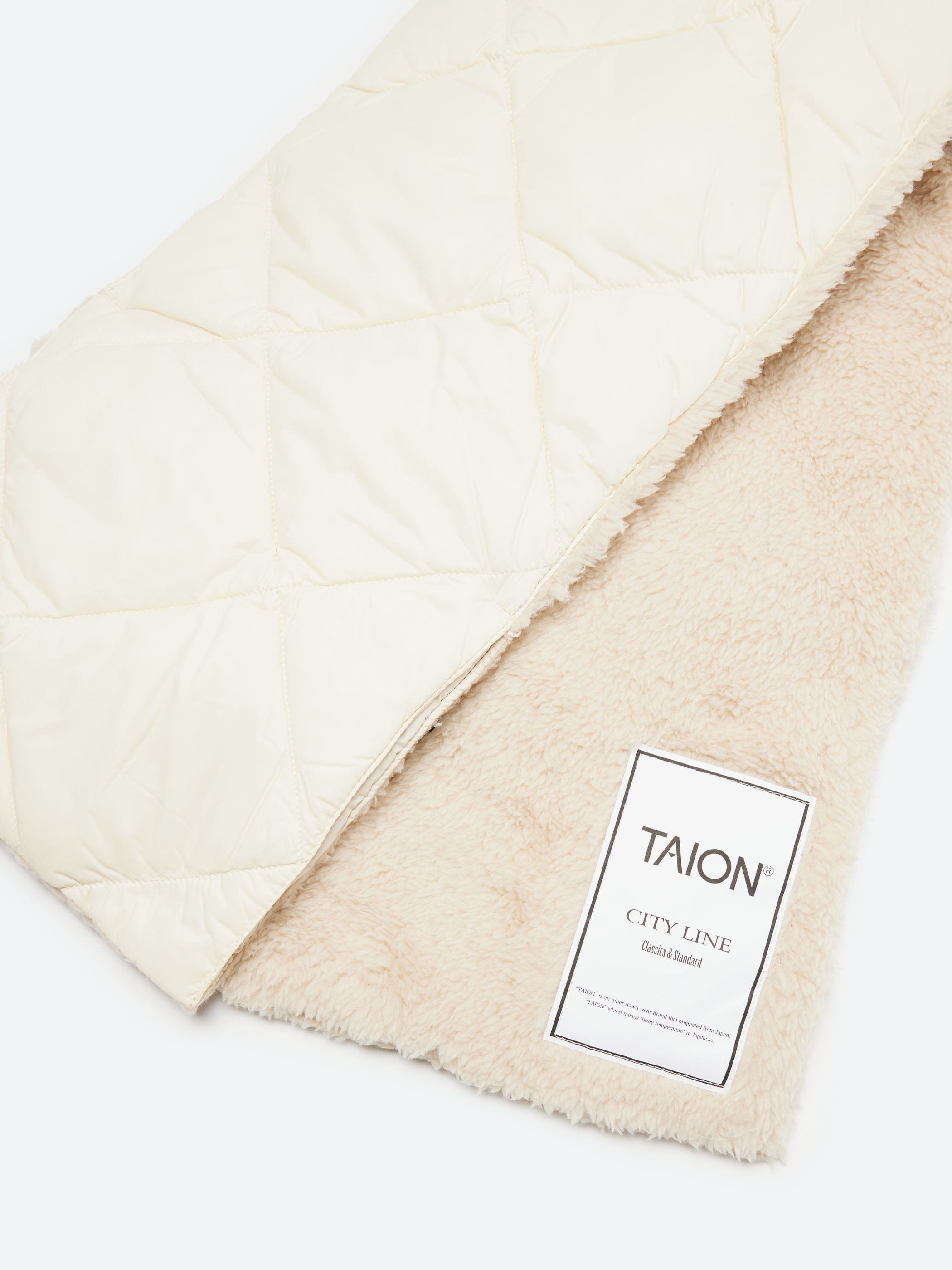 TAION City Reversible Down Muffler