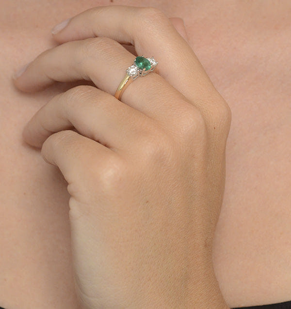 Diamond 0.70ct Oval Cut Emerald and Lab Diamond 3 Stone Ring in 9K Yellow Gold
