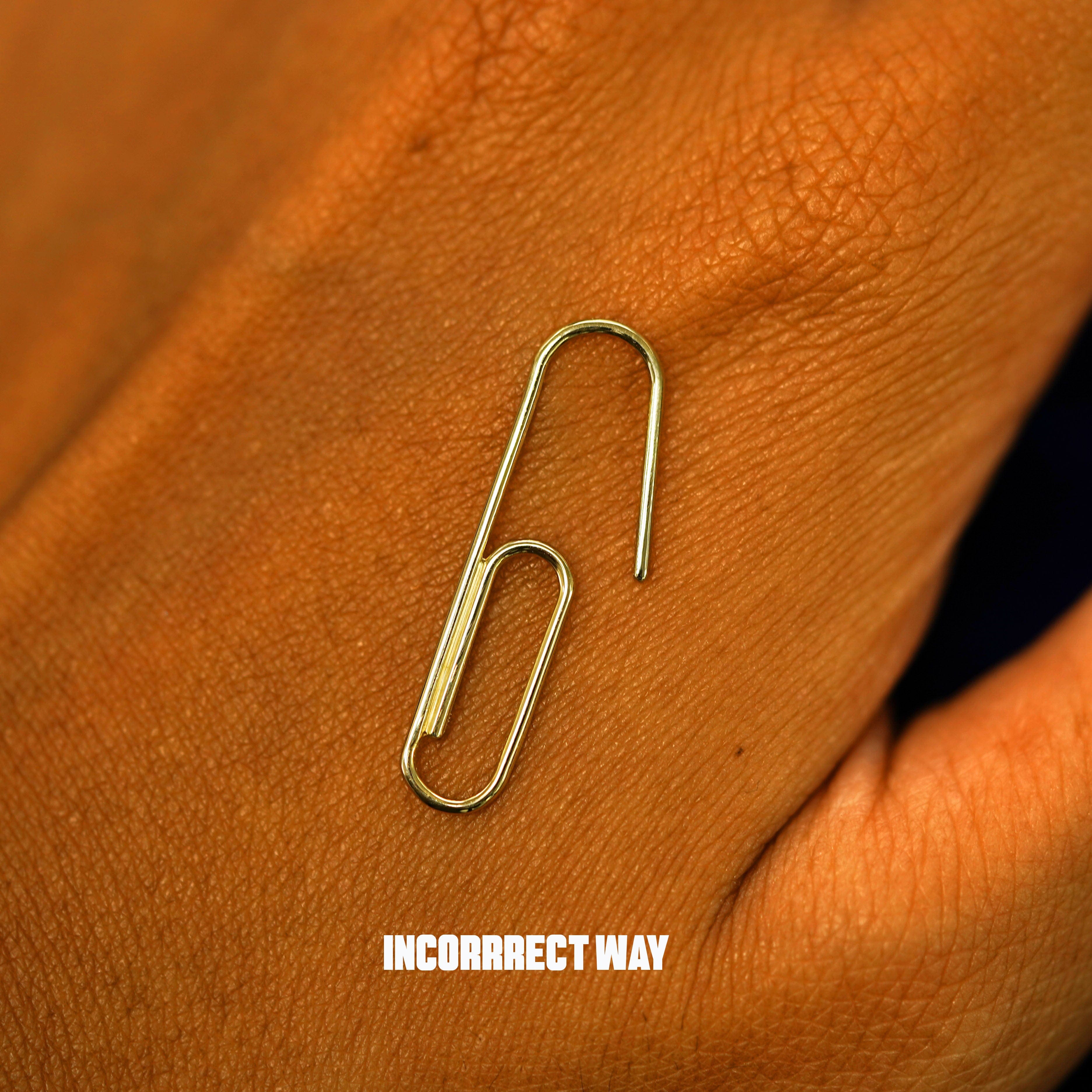Automic Gold Studio Not A Paper Clip Earring