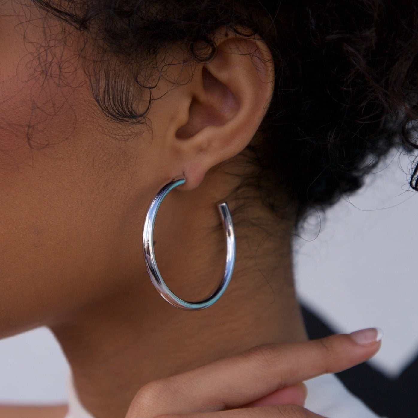GLD Women Tube Hoop Earrings in White Gold