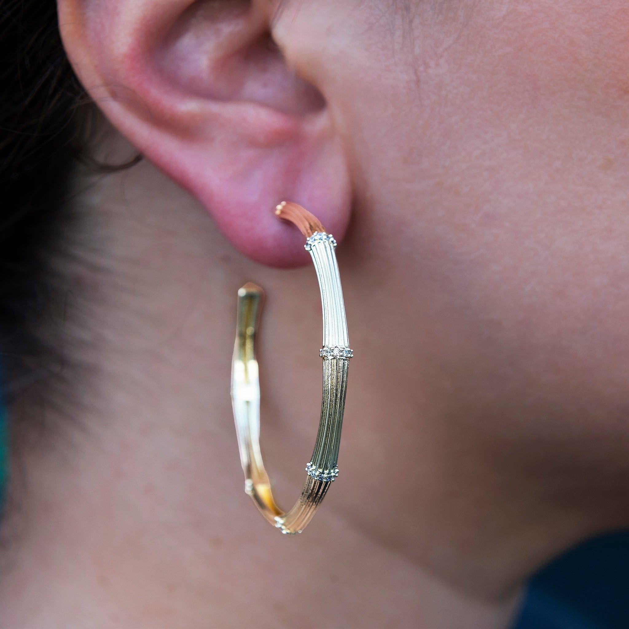 GLD Women Iced Textured Bamboo Hoop Earrings in Yellow Gold