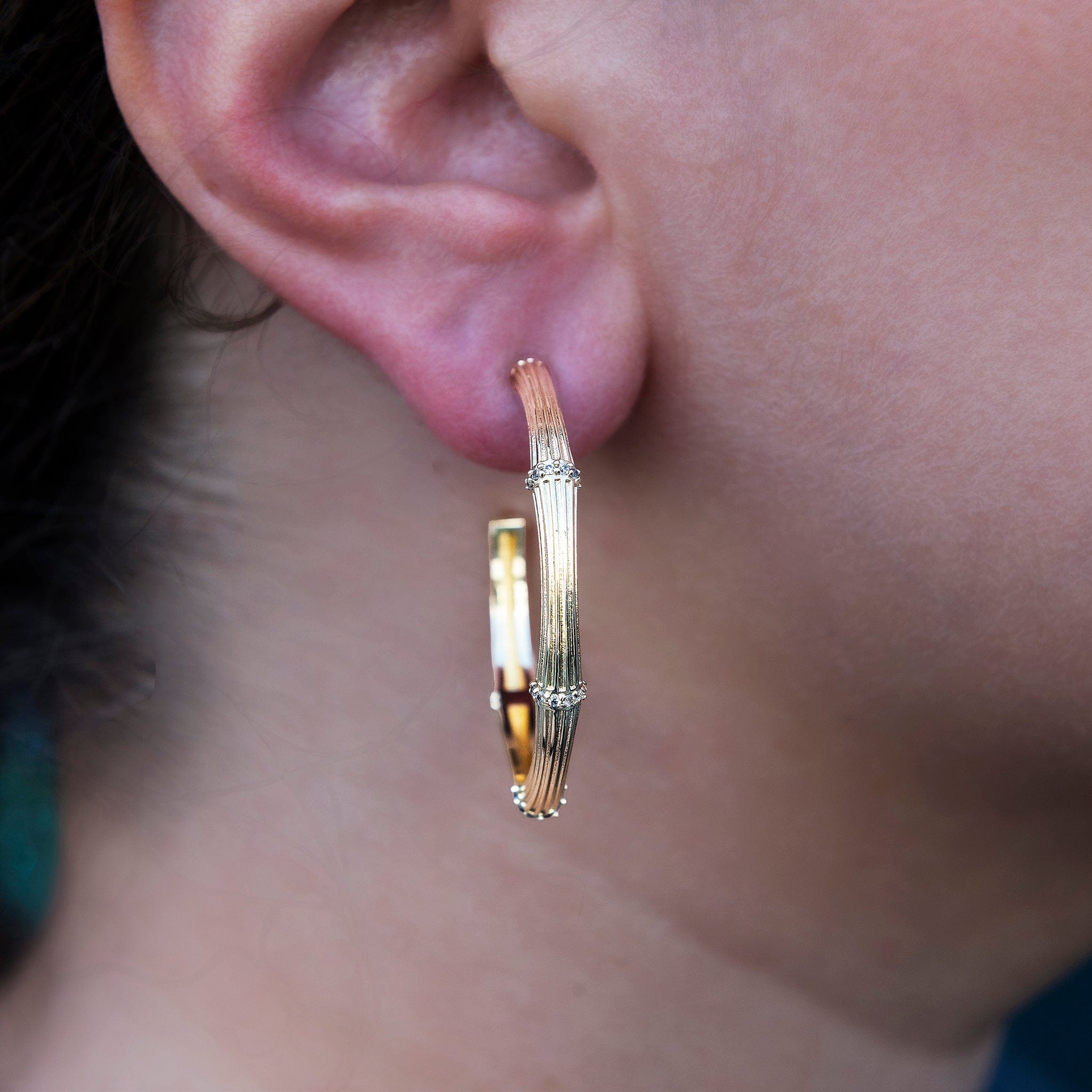 GLD Women Iced Textured Bamboo Hoop Earrings in Yellow Gold