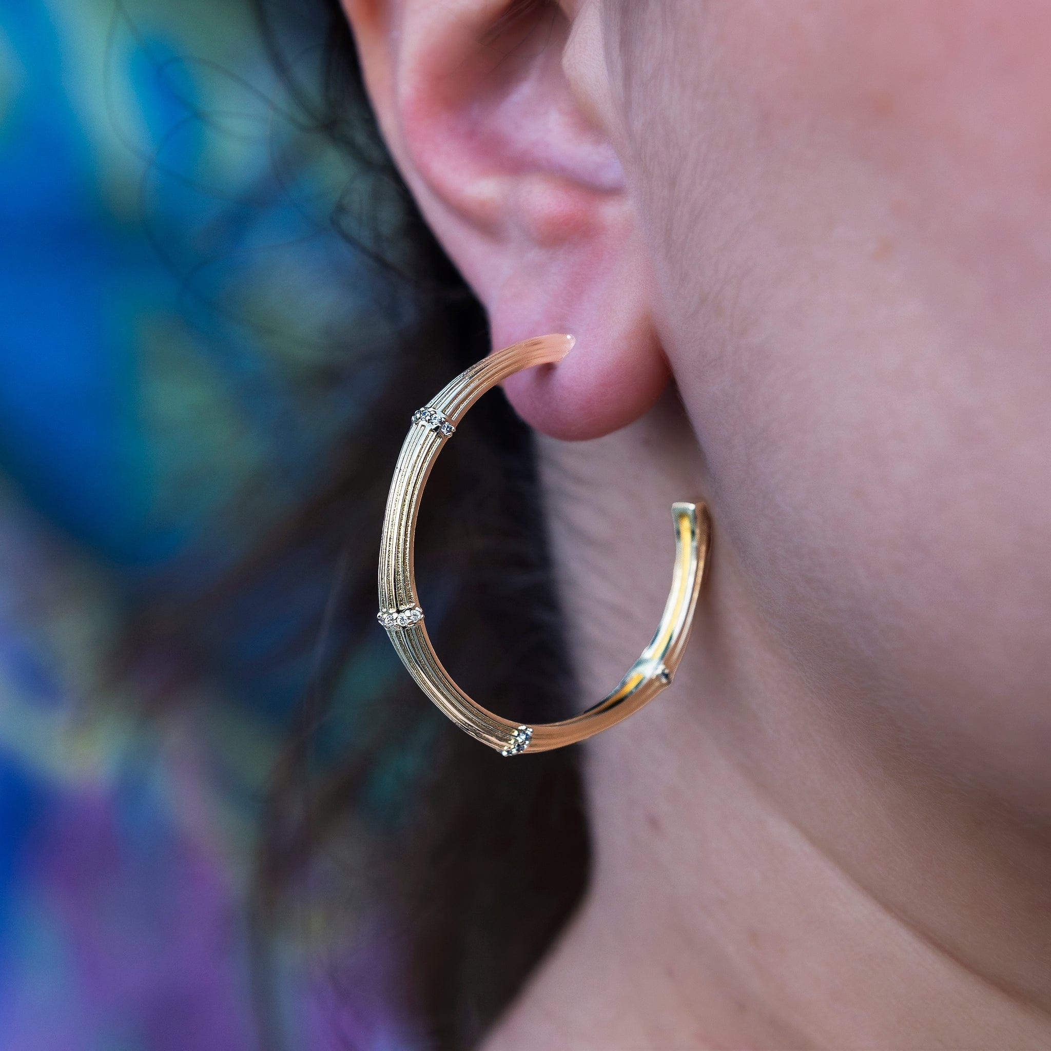 GLD Women Iced Textured Bamboo Hoop Earrings in Yellow Gold