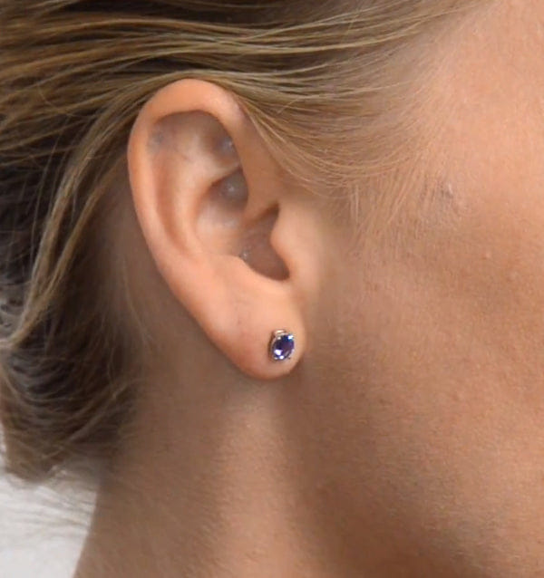WHITE* Tanzanite 5 x 4 mm (0.70ct) 9K White Gold Earrings