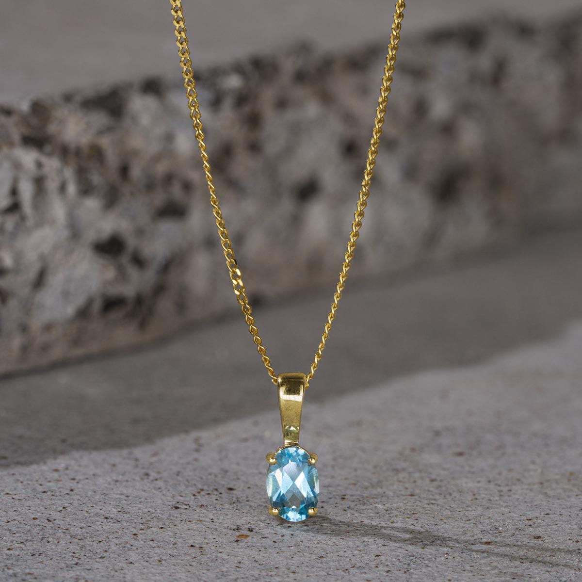 Yellow Blue Topaz 7 x 5 mm 9K Yellow Gold Pendant Necklace