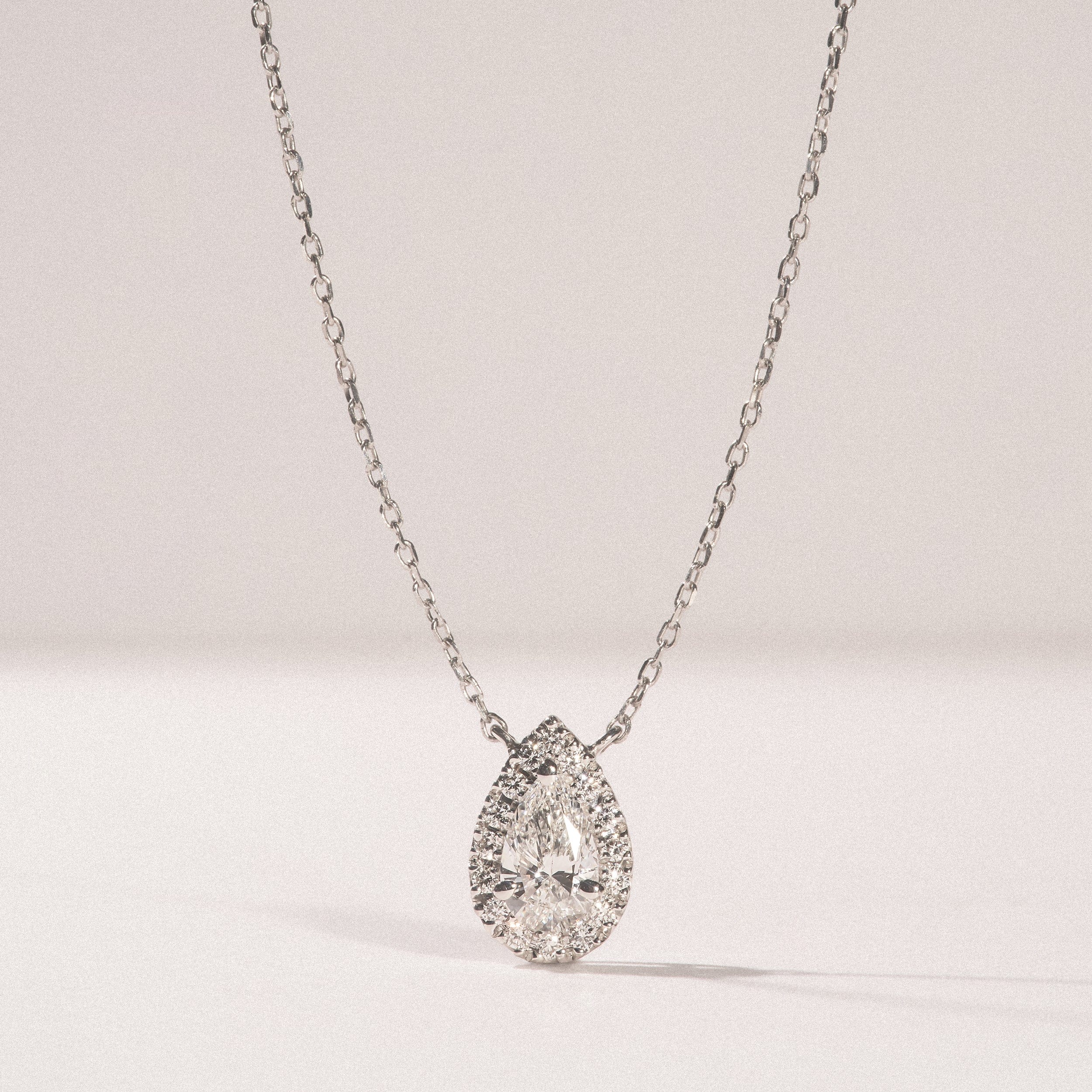 Diamond Masami Diamond Pear Halo Necklace 0.10ct Pave Set in 9K White Gold