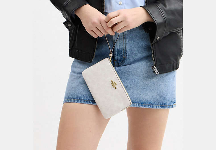 Large Corner Zip Wristlet In Signature Canvas