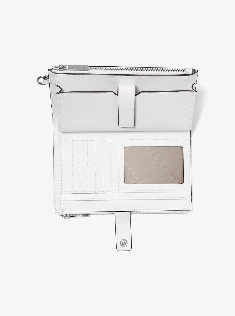 Jet Set Travel Rainbow Logo Embossed Wristlet