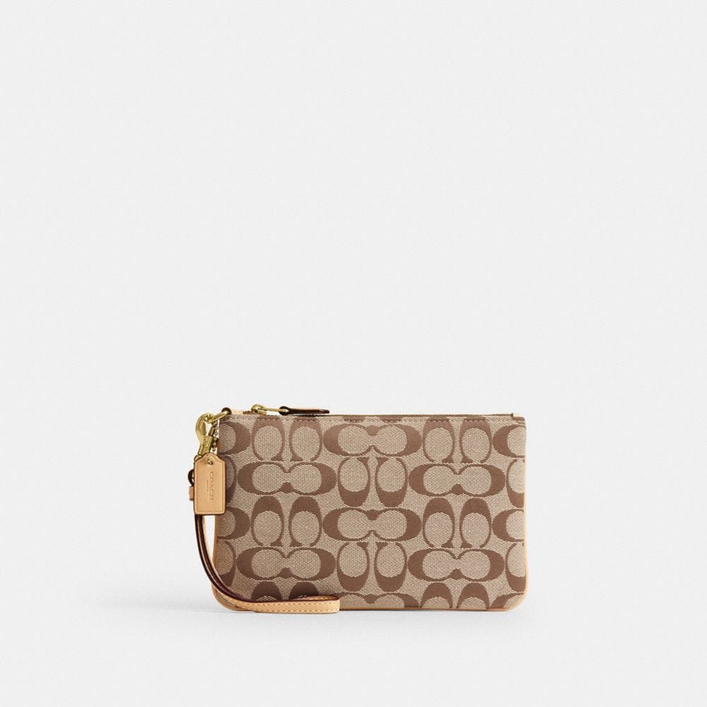 Coach Essential Small Wristlet In Signature Jacquard Brass Khaki Light Peach