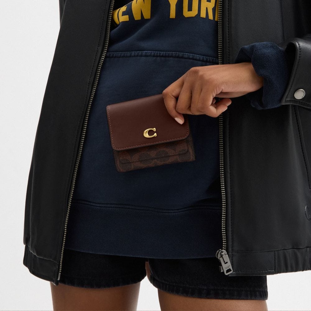 Coach Mila Small Flap Wallet In Signature Canvas Brass Maple