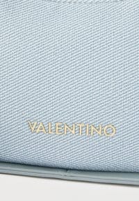 Valentino Atena Re Handbag Blue Denim