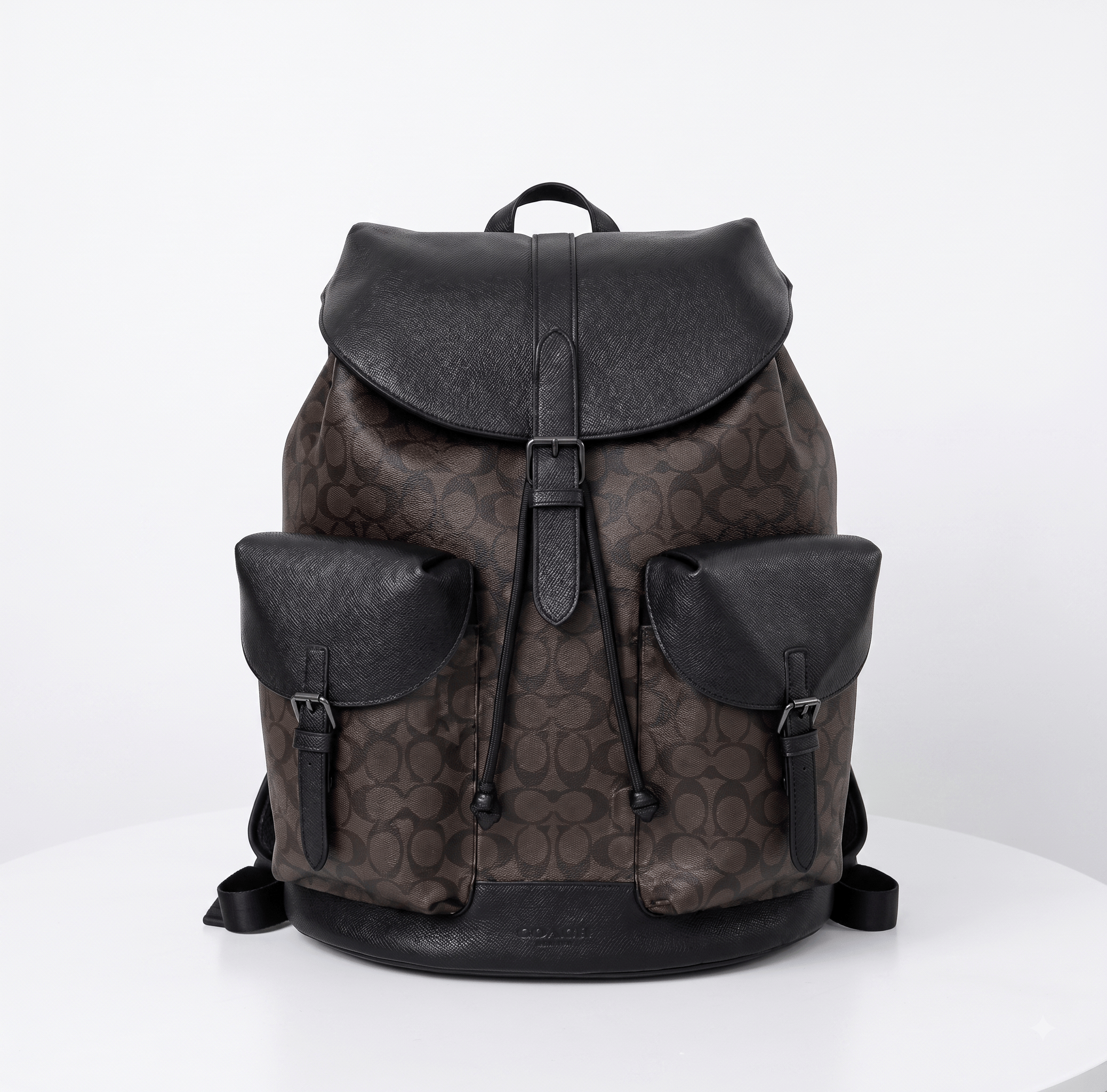 Coach Warner Backpack in Signature Canvas.