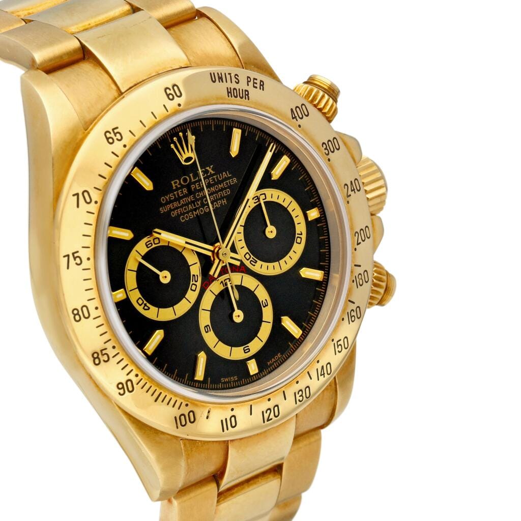 Cosmograph Daytona (Reference 16528). A yellow gold chronograph automatic wristwatch with bracelet. Circa 1999
