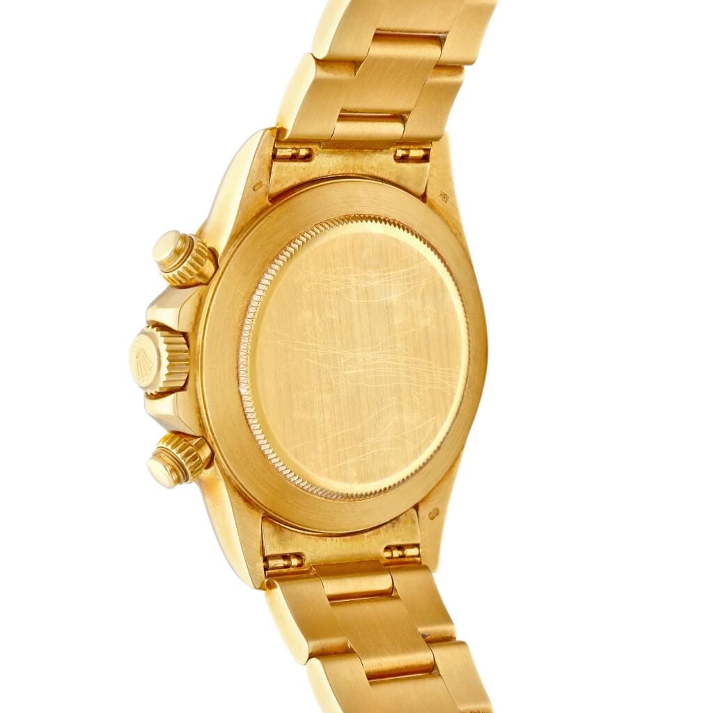 Cosmograph Daytona (Reference 16528). A yellow gold chronograph automatic wristwatch with bracelet. Circa 1999