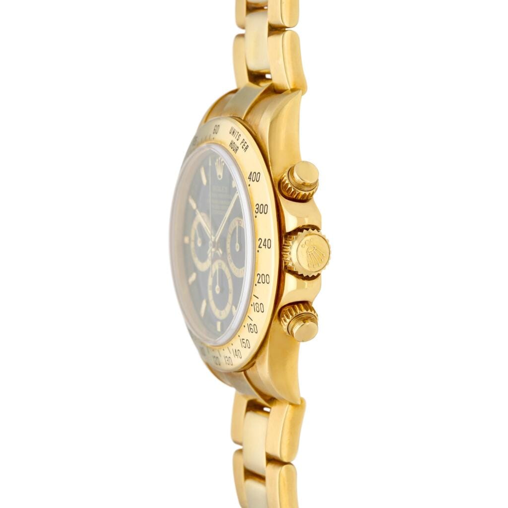 Cosmograph Daytona (Reference 16528). A yellow gold chronograph automatic wristwatch with bracelet. Circa 1999