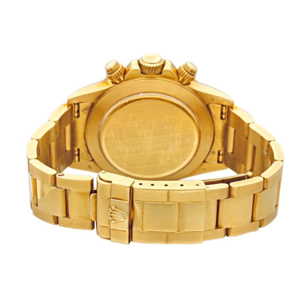 Cosmograph Daytona (Reference 16528). A yellow gold chronograph automatic wristwatch with bracelet. Circa 1999