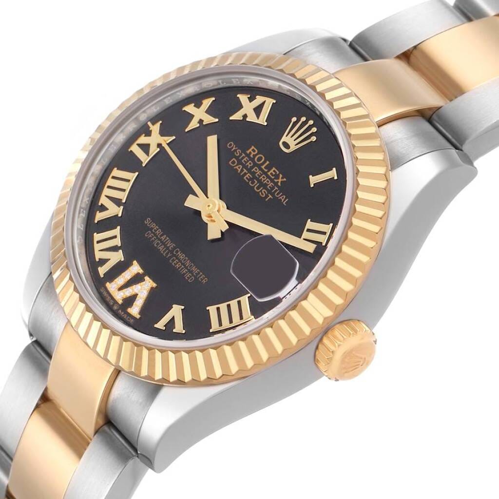 Datejust (Reference 278273). A 31mm yellow gold stainless steel automatic wristwatch with date. 2024