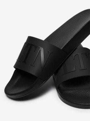 Valentino embossed-logo flip-flops