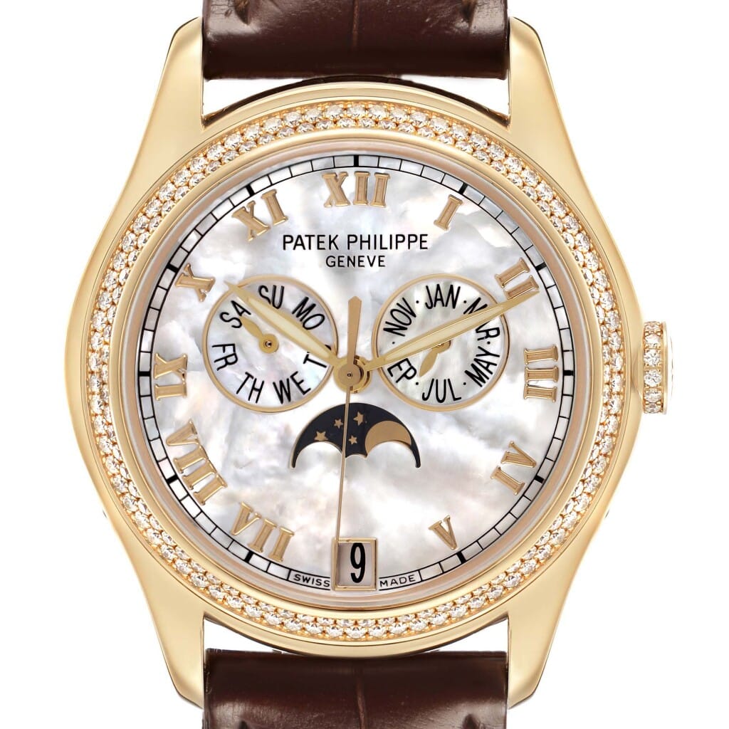 Complications (Reference 4936J-001). A 37mm yellow gold diamond-set automatic wristwatch with date, moonphase, and annual calendar.