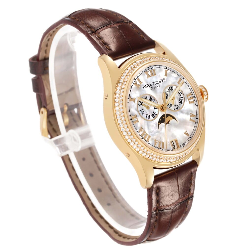 Complications (Reference 4936J-001). A 37mm yellow gold diamond-set automatic wristwatch with date, moonphase, and annual calendar.