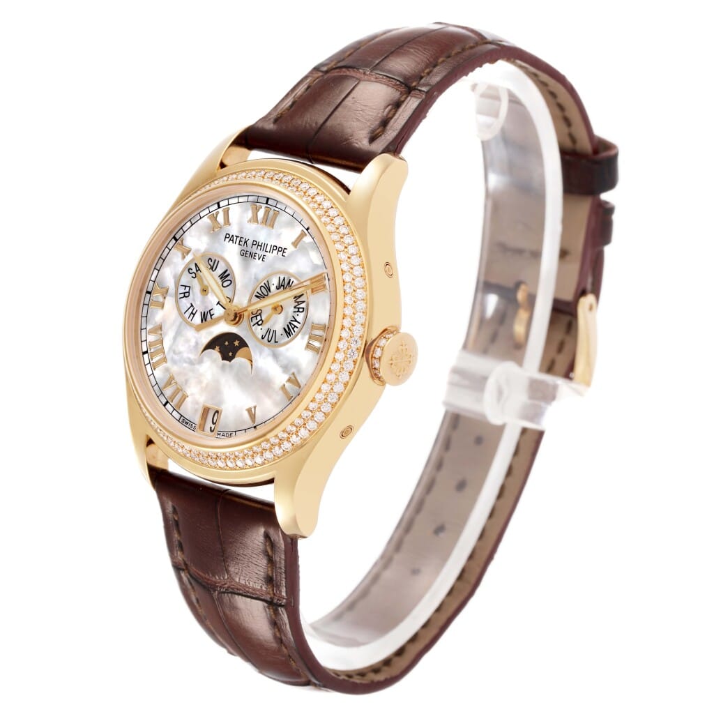 Complications (Reference 4936J-001). A 37mm yellow gold diamond-set automatic wristwatch with date, moonphase, and annual calendar.