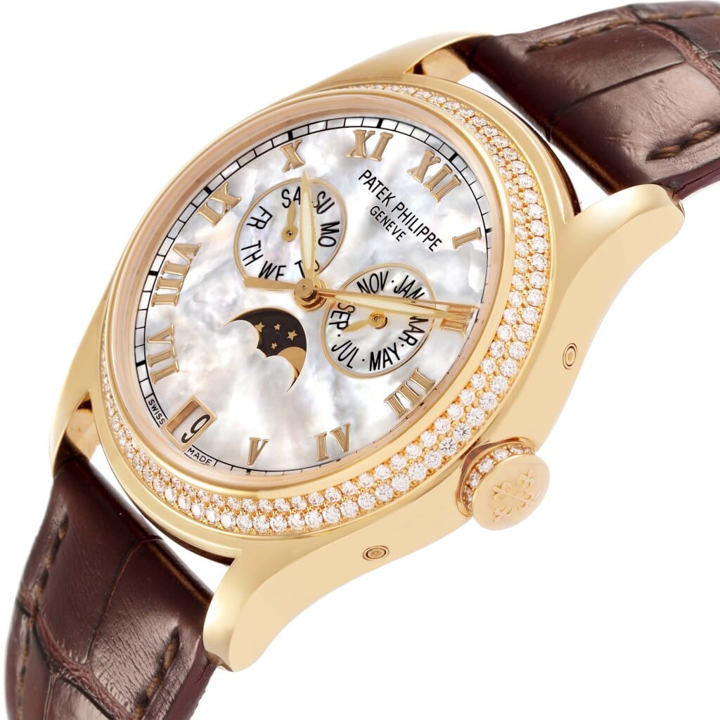 Complications (Reference 4936J-001). A 37mm yellow gold diamond-set automatic wristwatch with date, moonphase, and annual calendar.