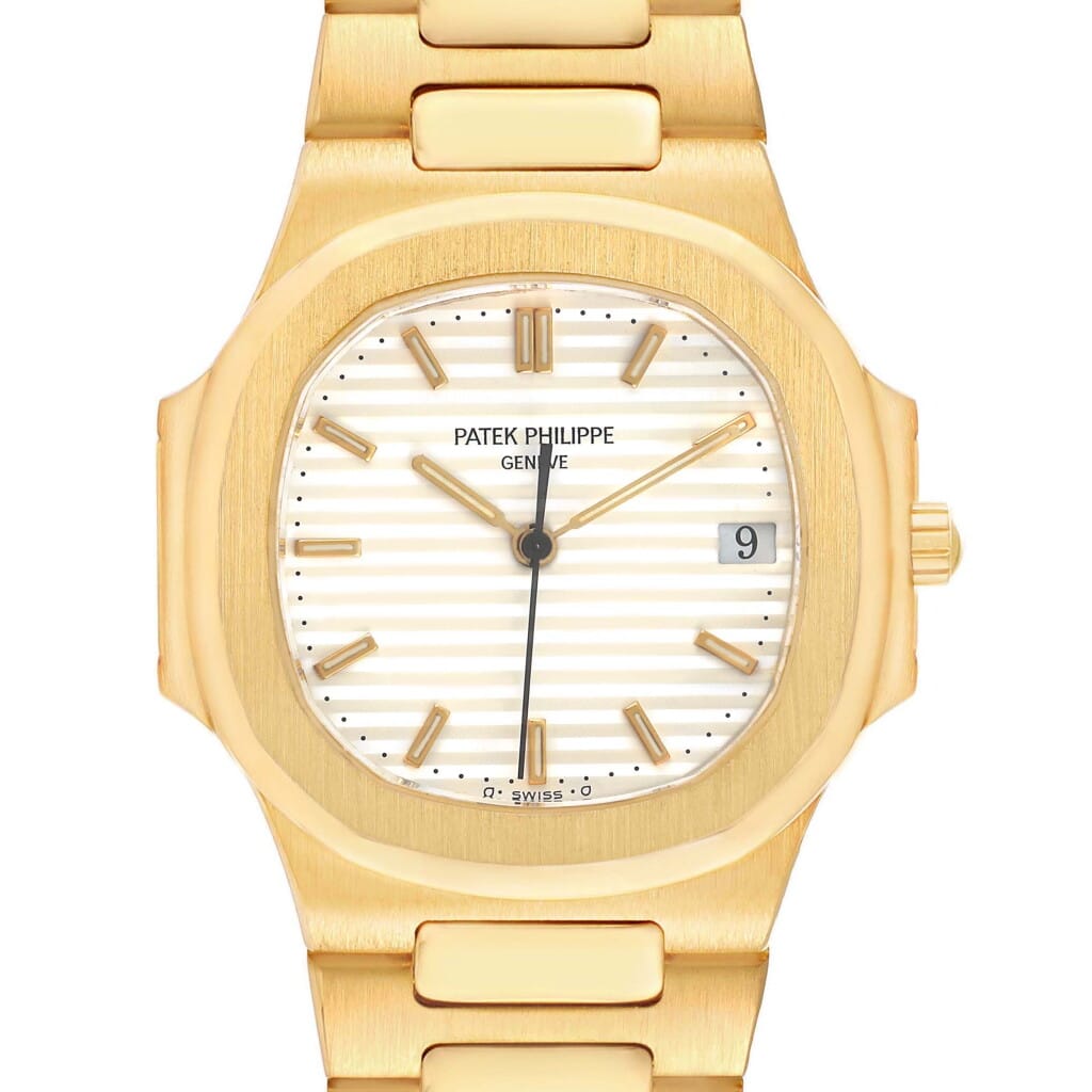 Nautilus (Reference 3900/1). A 33mm yellow gold quartz wristwatch with date.