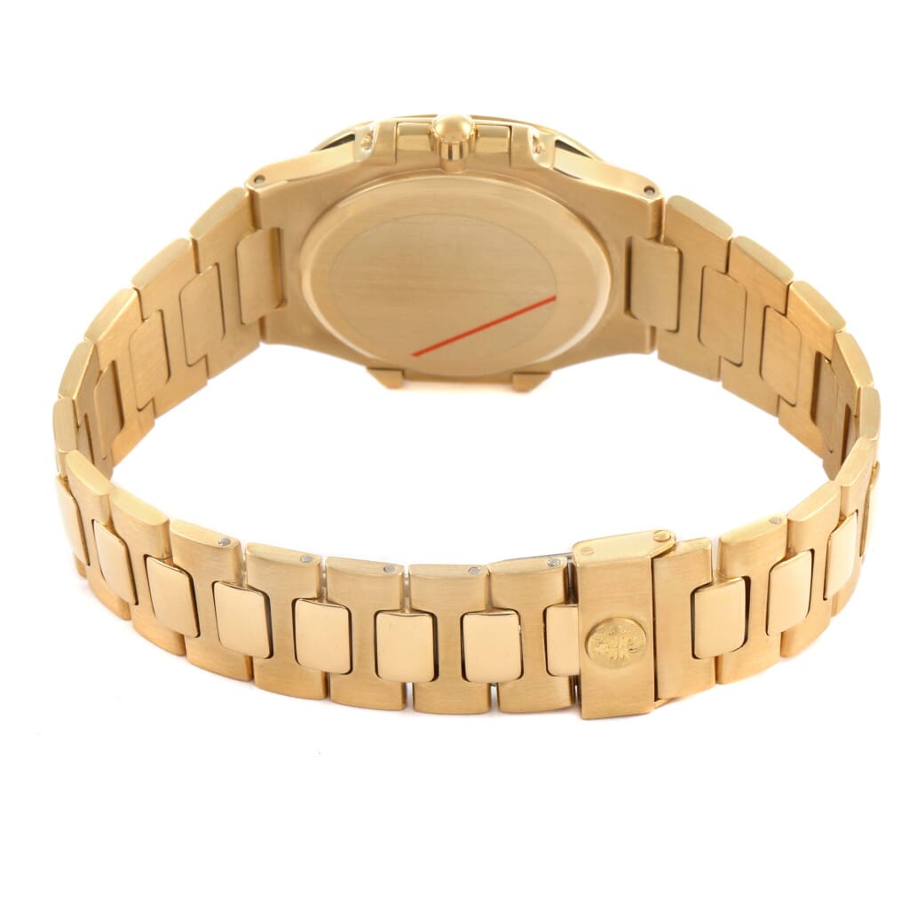 Nautilus (Reference 3900/1). A 33mm yellow gold quartz wristwatch with date.