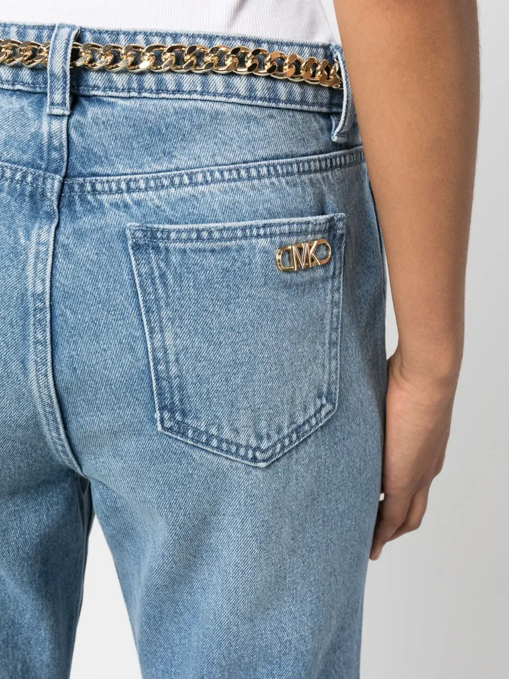 belted bootcut jeans