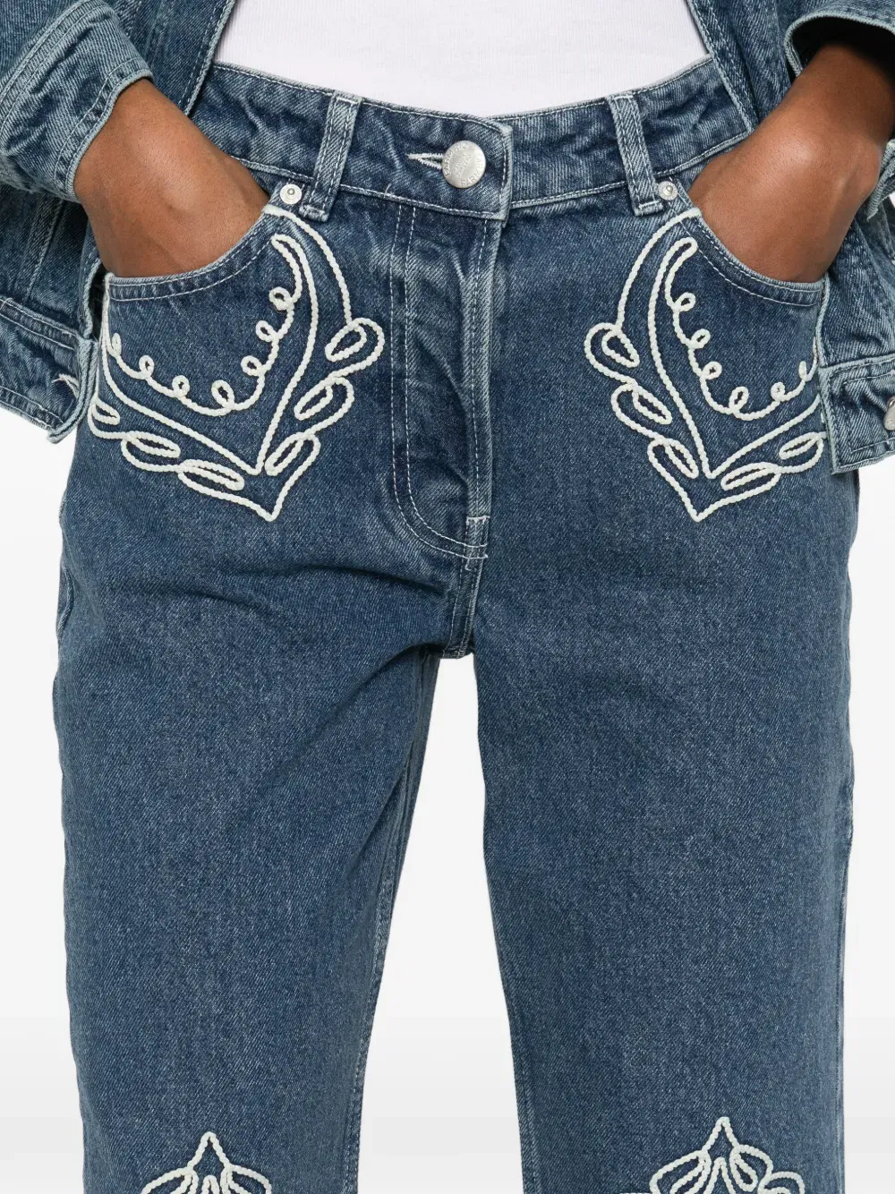embroidered fringed jeans