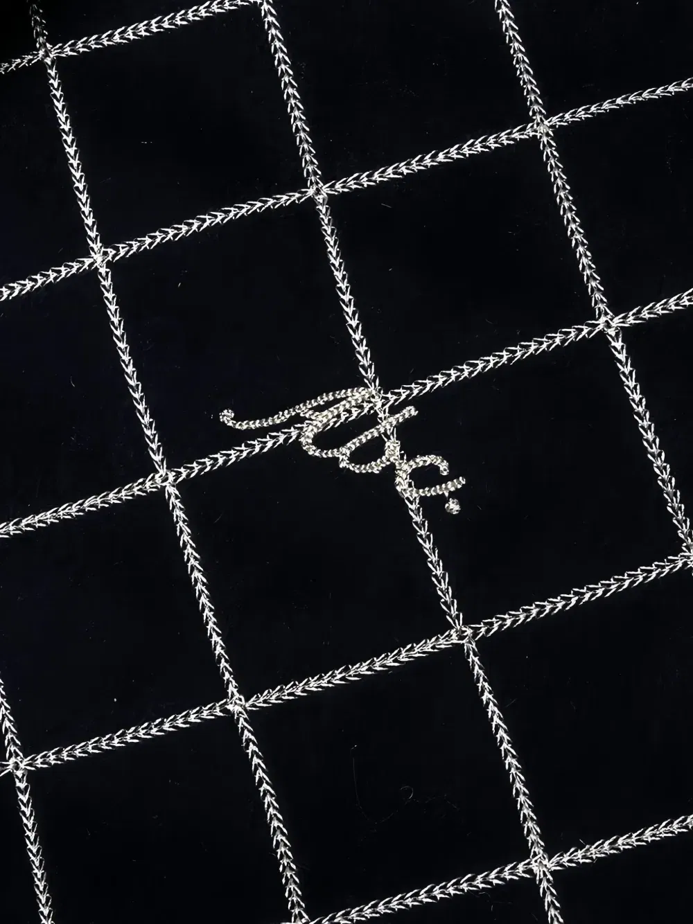 diamond-quilted zip-detail trousers