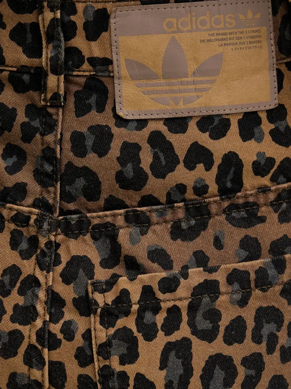 leopard-print striped jeans