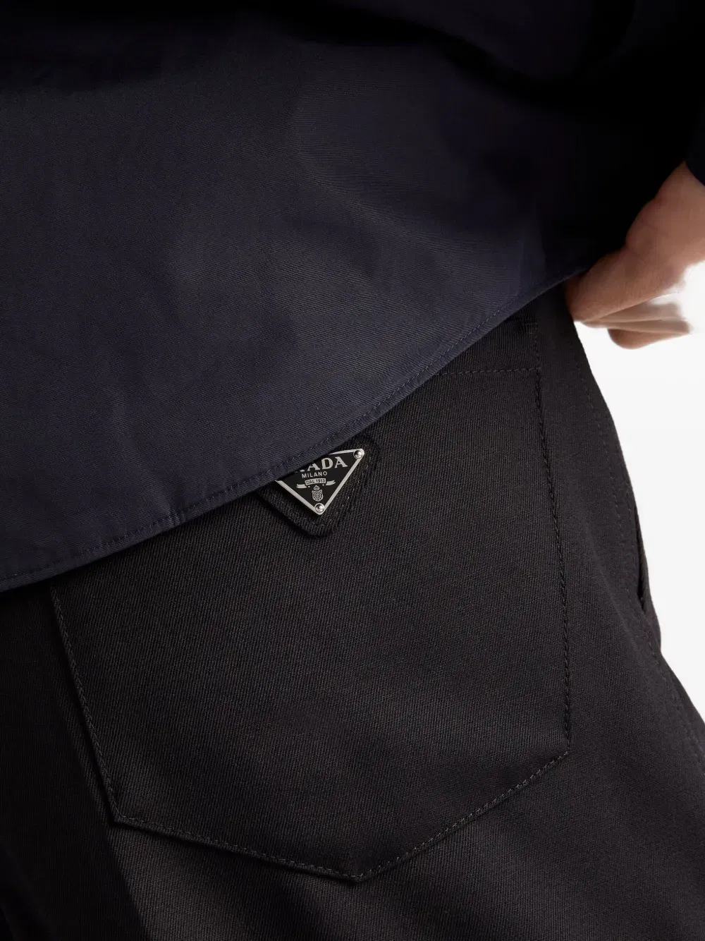 triangle-logo wool trousers
